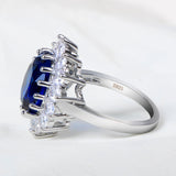 Fashionable Oval Lab Sapphire Sunflower Design Ring - Rings Universe