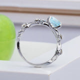 Fashion Hollowed out Flowers Lab Created Aquamarine Ring - Rings Universe