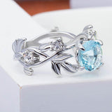 Fashion Hollowed out Flowers Lab Created Aquamarine Ring - Rings Universe