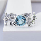 Fashion Hollowed out Flowers Lab Created Aquamarine Ring - Rings Universe