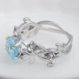 Fashion Hollowed out Flowers Lab Created Aquamarine Ring - Rings Universe