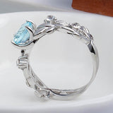 Fashion Hollowed out Flowers Lab Created Aquamarine Ring - Rings Universe